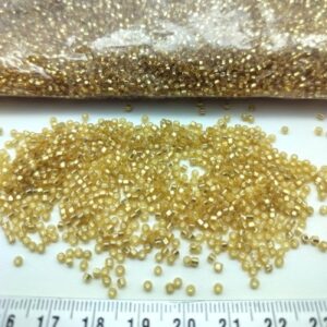 Sachet 500 gr. Rocailles verre ~2mm x Or pâle Silver line
