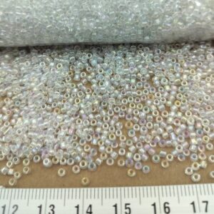 Sachet 500 gr. Rocailles verre ~2mm Blanc translucide Rainbow